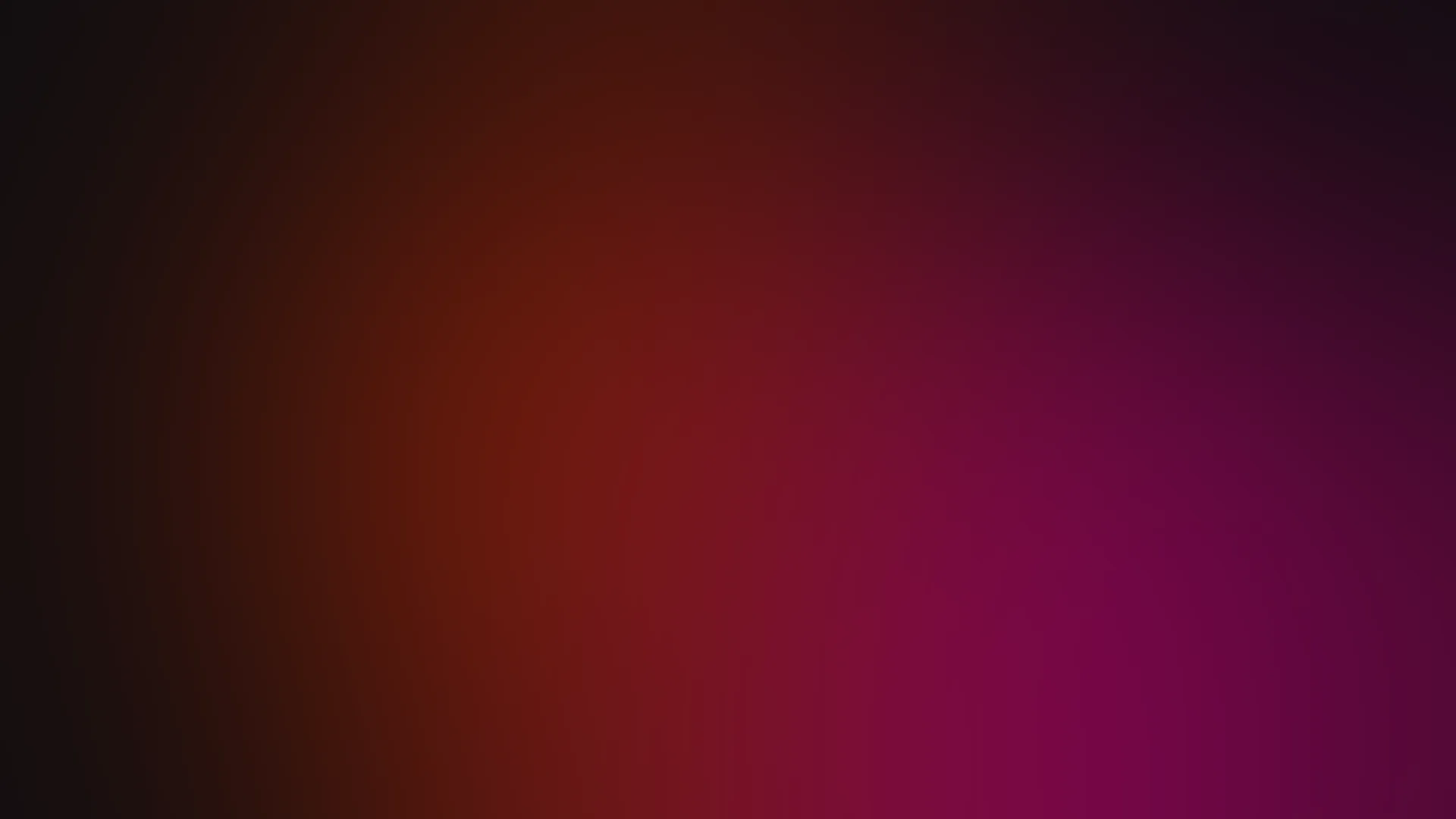 Abstract red and magenta glow on a dark background